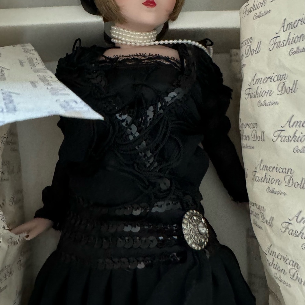 Lady with black formal dress , 17 inch. Never used with pearl necklace